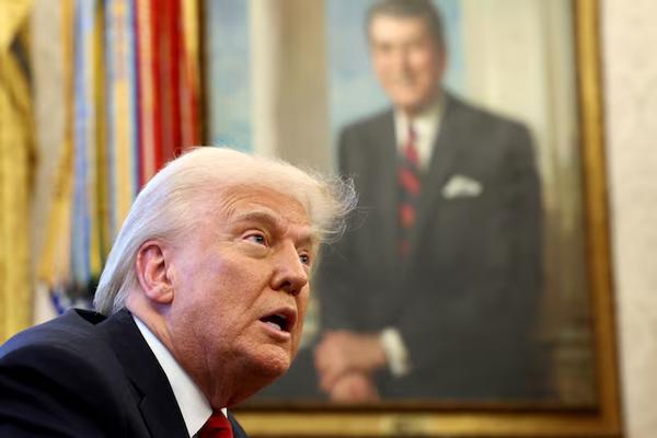 U.S. President Donald Trump speaks to the media in the Oval Office at the White House in Washington, D.C., U.S., March 26, 2025. REUTERS