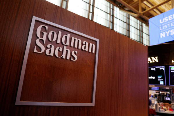 The logo for Goldman Sachs on the NYSE trading floor