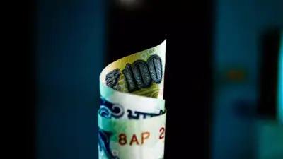 Respite for rupee as dollar dives