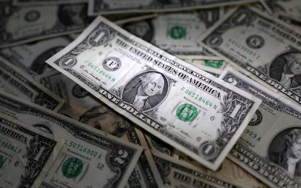 U.S. dollar banknotes are seen in this illustration taken March 10, 2023. REUTERS