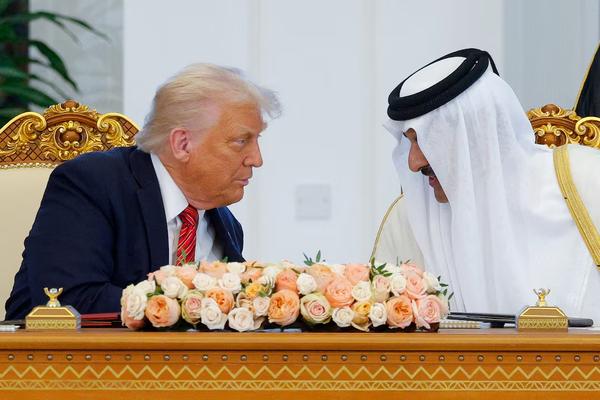 U.S. President Donald Trump and Qatar's Emir Tamim bin Hamad Al Thani at the signing ceremony in Doha