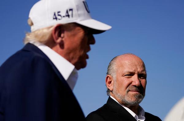 U.S. President Donald Trump with Commerce Secretary Howard Lutnick at Morristown Airport