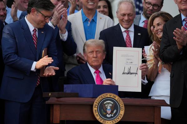 President Trump signing the OBBBA into law