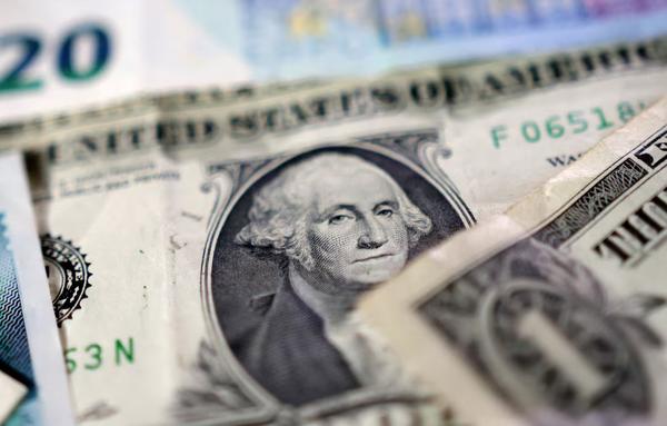 U.S. dollar banknotes are seen in this illustration taken May 4, 2025. REUTERS
