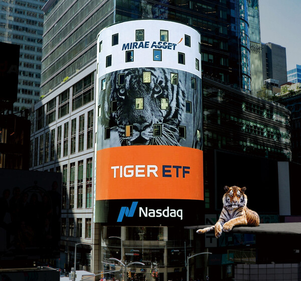 An advertisement for Mirae Asset Global Investments' TIGER ETF on the NASDAQ Tower electronic board.