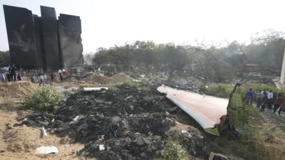Air India crash (Picture credit: AP) Air India crash: Parliamentary panels seek answers from DGCA, airlines; aviation safety, fare surge under lens