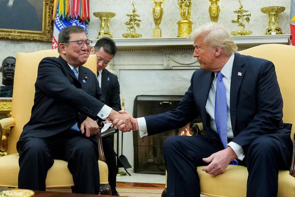 U.S. President Donald Trump shakes hands with Japan's Prime Minister Shigeru Ishiba at the White House