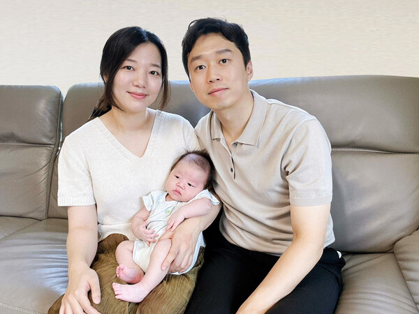 A happy family supported by Hana's Childcare Fund