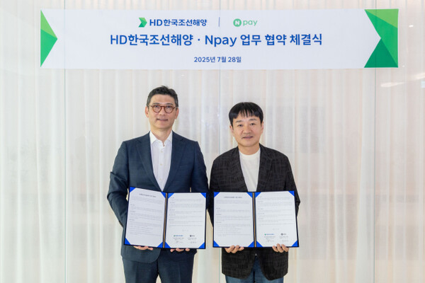 Kim Seong-jun and Park Sang-jin at the MOU signing ceremony