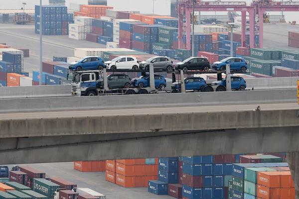 A car carrier transporting vehicles made by South Korea's automaker Kia Corp.